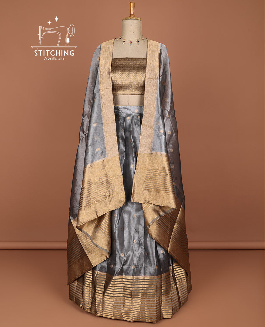 Grey buttas half saree with contrast striped zari design border, zari design blouse & floral zari design dhavani