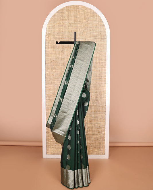 Dark green leaf buttas vasundhara elite silk saree with self intricate zari design border & floral vine design pallu