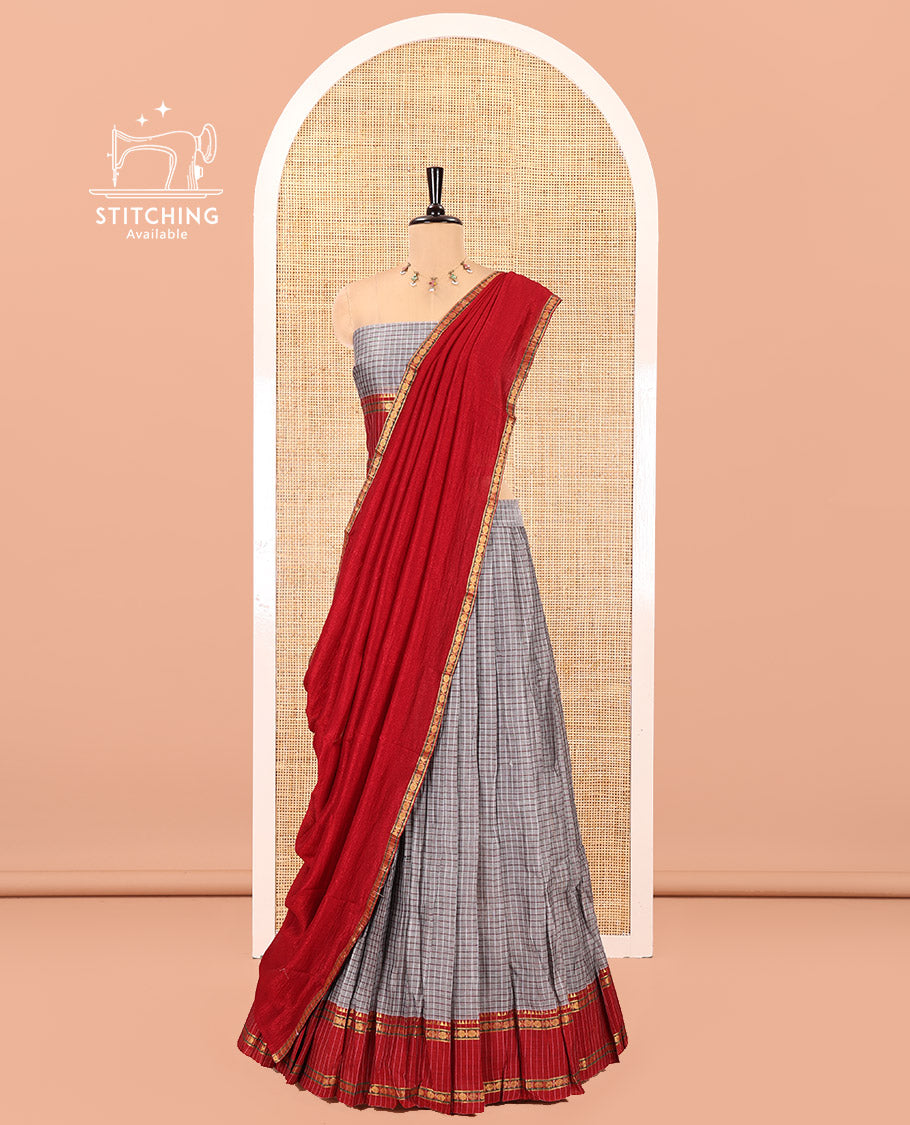Grey and Red Sungudi Cotton Half-Saree, Elevated with Checked Design with Contrast Traditional Design Rettai Pettu Bordered Skirt, Comes with a Matching Blouse, and Is Paired with a Contrast Dhavani