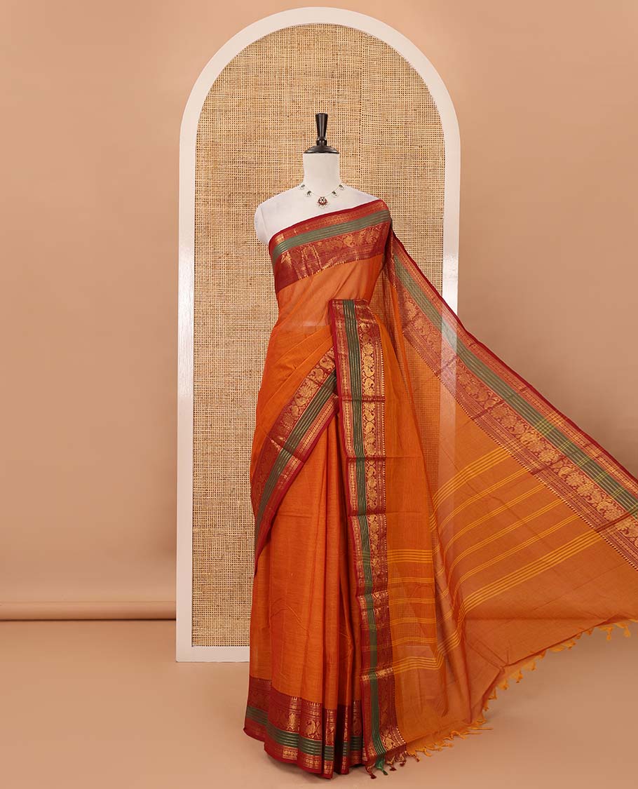 Grey plain Chettinad cotton saree, contrast zari border of temple, rudraksham & annam motifs, striped pallu & matching blouse of zari border