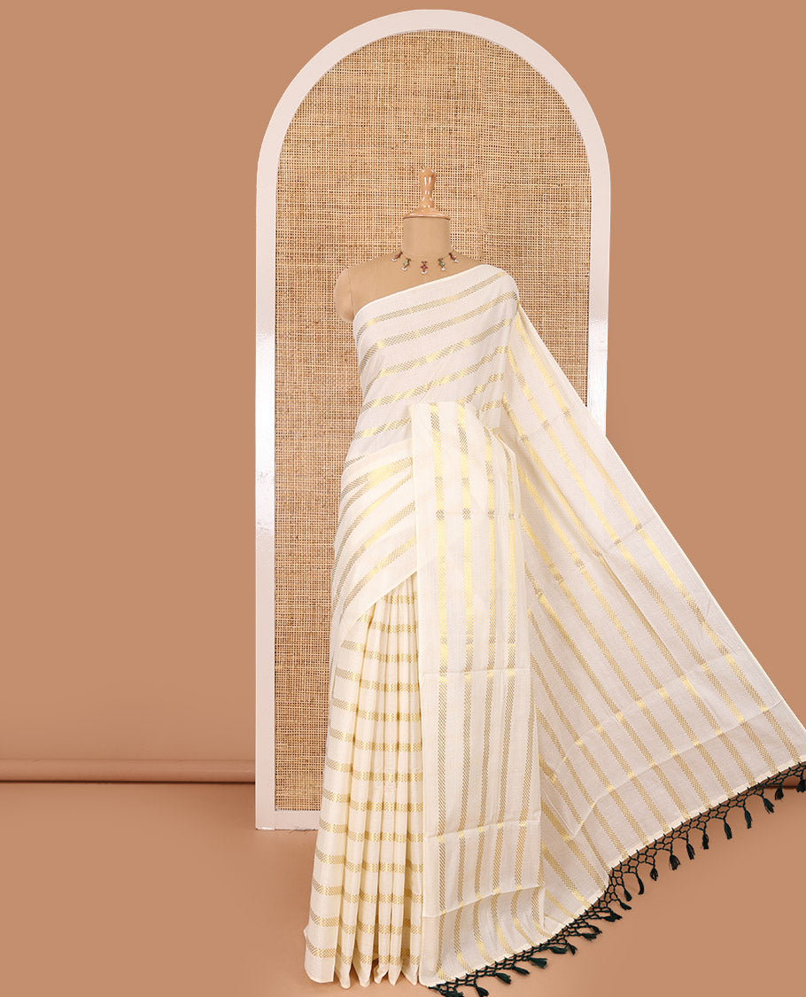 Borderless cream and green horizontal muthu zari striped Kerala cotton saree, self-pallu with tassels, and a matching blouse