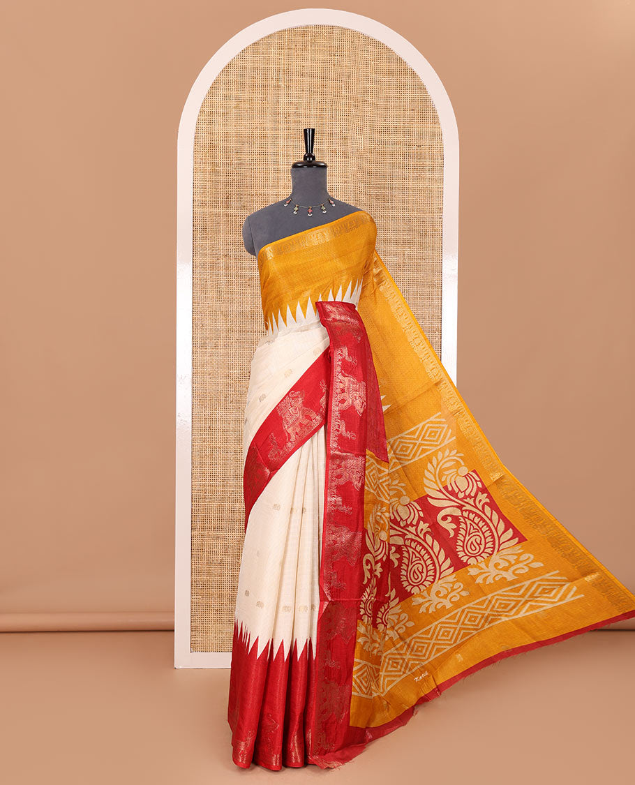 Half-white zari stripes and buttas dola silk saree, contrast red-orange Ganga-Jamuna temple elephant motifs border, paisleys printed pallu, and contrast elephant buttas blouse