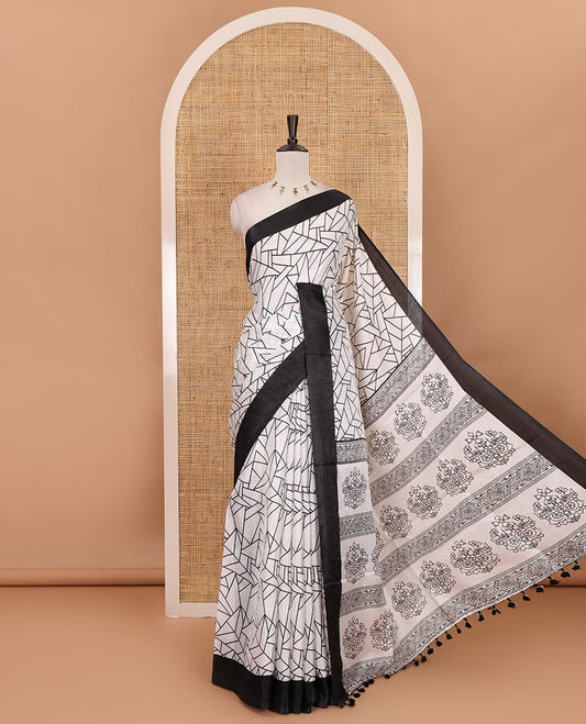 White geometric patterned khadi cotton saree, contrast black plain border & intricately printed pallu