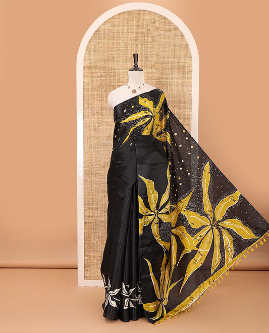 Black-base plain body khadi cotton saree with batik-style yellow-color radiant sunburst design on its border & pallu, plain black blouse