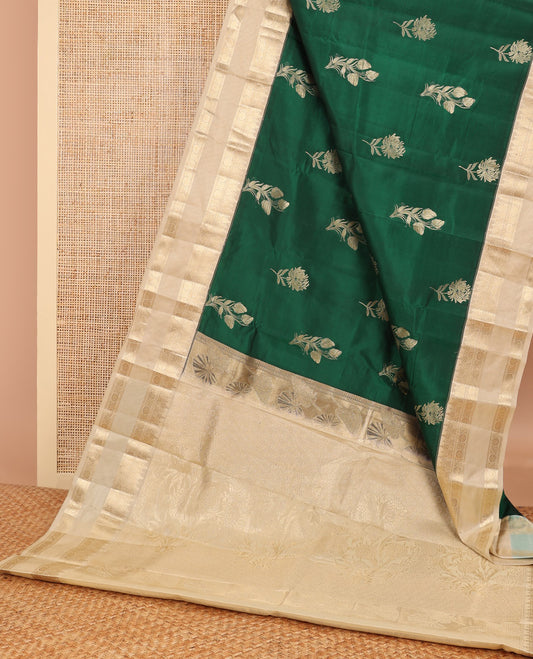 Bottle green floral design vasundhara elite silk saree with contrast traditional zari design border & floral zari design pallu