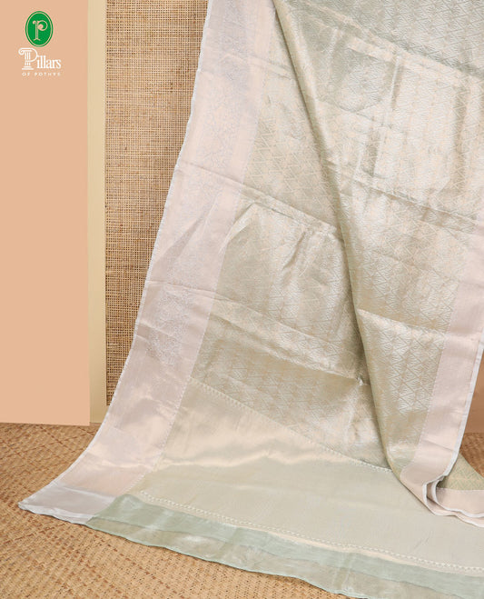 Pista green weaving design banaras kora tissue saree with contrast jacquard border & rich pallu along with brocade blouse
