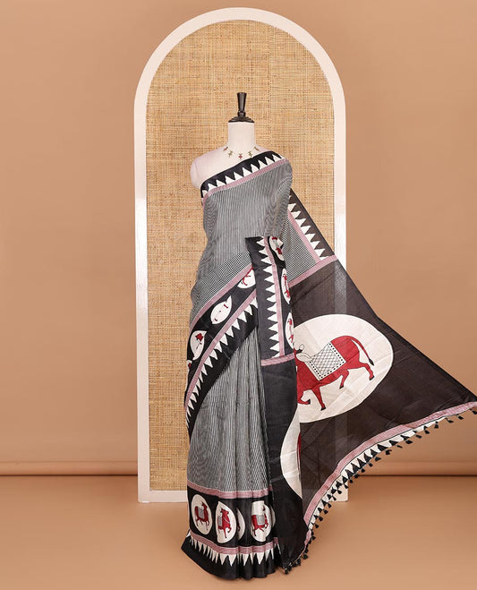 Cream-black vertically striped khadi cotton saree, contrast Pichwai cow printed temple border, Pichwai cow print pallu, and jaal printed blouse