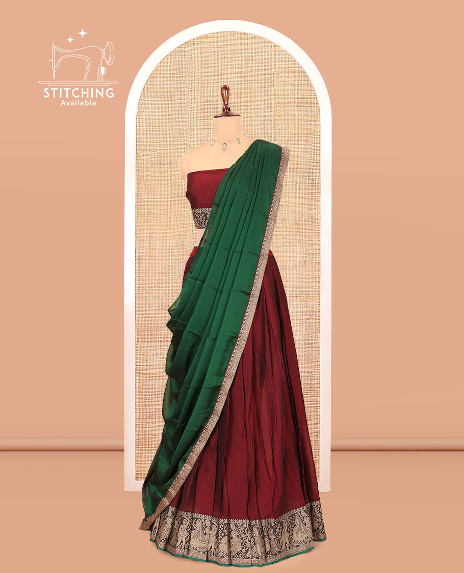 Maroon Mercerised Cotton Half-Saree Features a Plain Skirt, a Bridegroom Motif Border, a Matching Blouse, a Contrast Dhavani