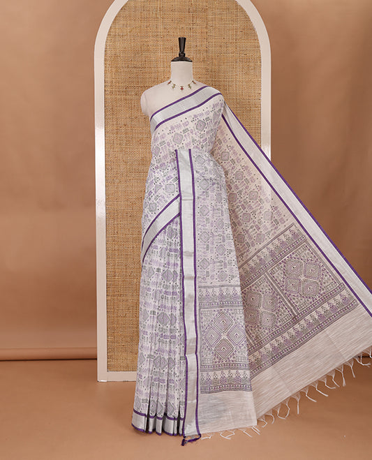 White with violet vareli pattern printed design linen with silver zari bawanchi border  & printed pallu with tussels