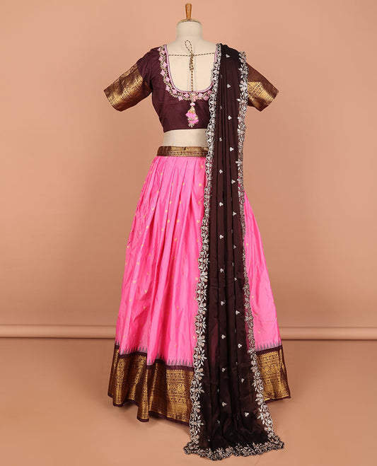 Pink floral buttas semi-stitched half saree with contrast zari border,  embroidered blouse & scallop border dhavani