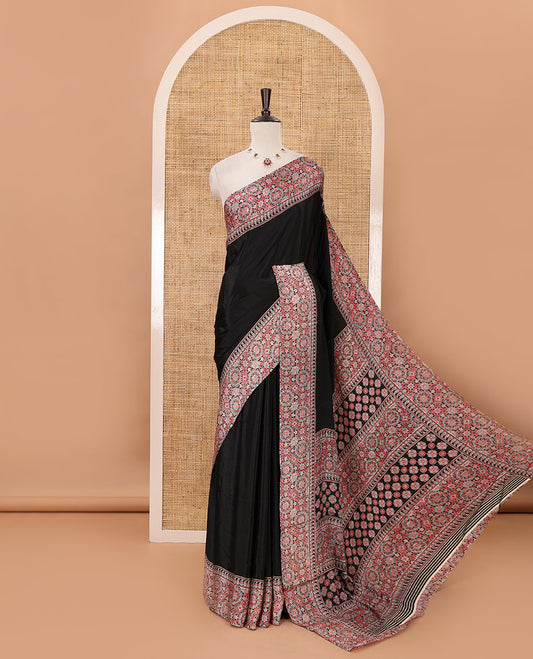 Black plain design Turkey crepe saree, intricately Ajrakh-printed border, pallu & matching blouse
