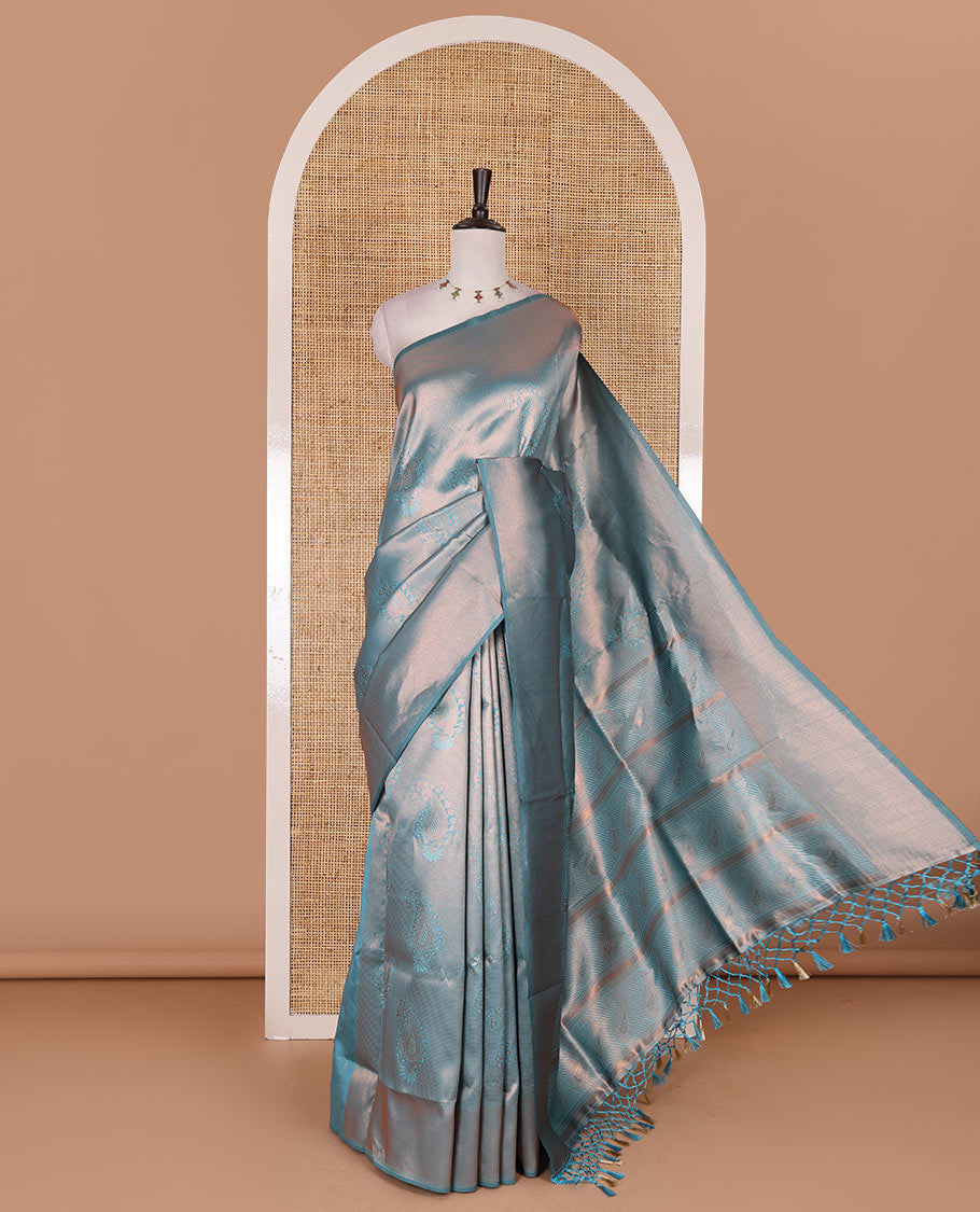 Light blue paisley zari jacquard Kanchi tissue saree, zari border, pallu steeped with paisleys, and jacquard matching blouse