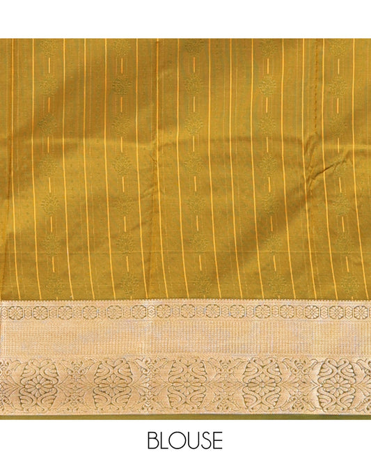 Yellow Art Silk Half-Saree Pavadai Material Features a Zari-Buttas Skirt, a Contrast Traditional Border, Contrast Blouse, and Scallop Embroidered Dhavani