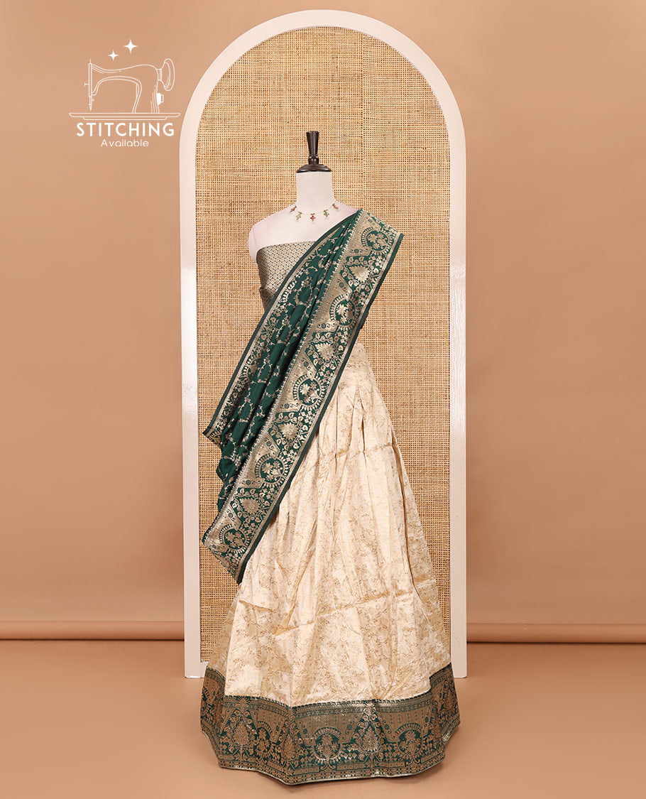 Cream-bottle green semi-banaras half-saree, floral jaal jacquard & contrast traditional zari border skirt, floral jacquard blouse & contrast zari design blouse