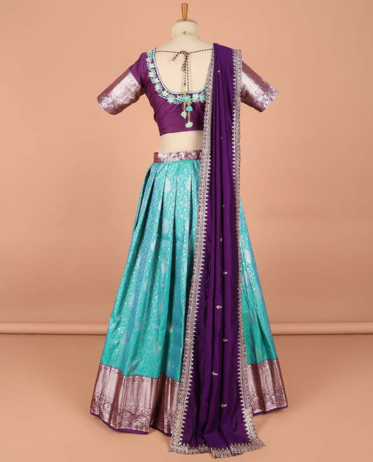 Blue floral jacquard semi-stitched half saree with contrast zari border,  embroidered blouse & scallop border dhavani