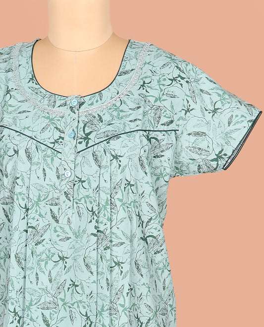 Pale Green Cotton Nighty Prettified with Floral Vine Design Print, Featuring Lace Work, Round Front Neck, and Half-Sleeves