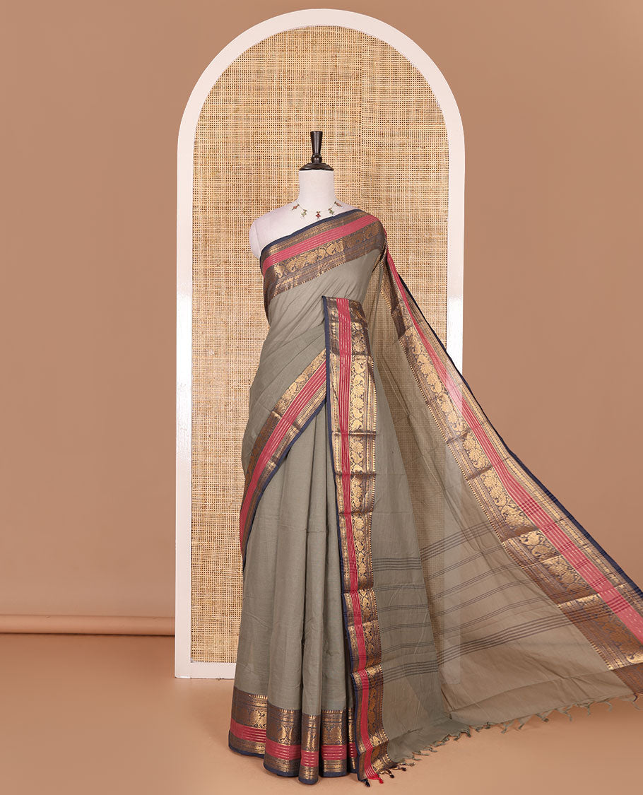 Light grey plain Chettinad cotton saree, contrast rettai rettu annam and temple motif zari border, striped pallu, and matching blouse