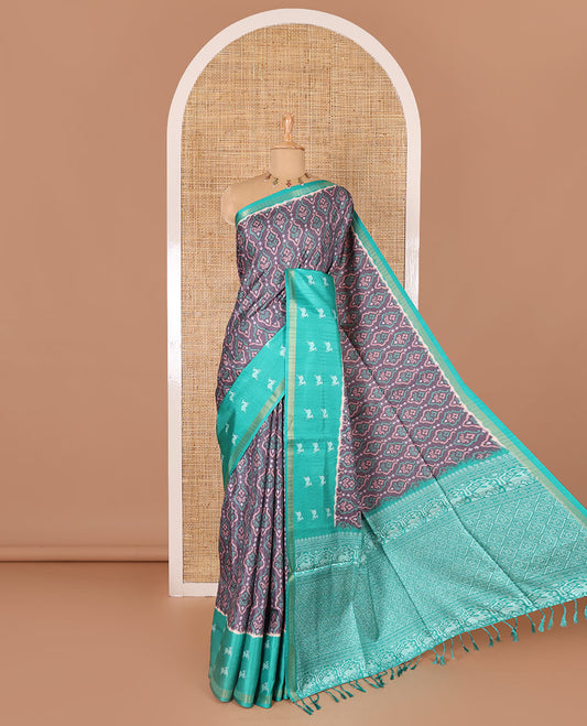 Grey and blue Pochampally ikkat printed katan silk saree, contrast deer motifs printed zari border, jaal printed pallu, and contrast deer motifs printed blouse