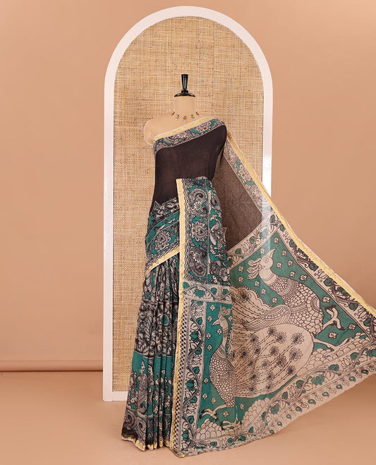 Green kalamkari floral, peacock, and human figurines printed Kota cotton saree, contrast printed border, peacock printed pallu, and a contrast floral printed blouse