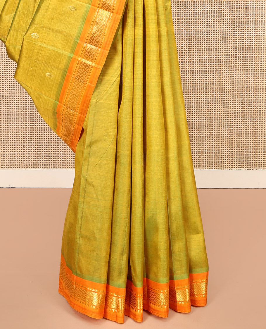 Green Kanchipuram Silk Saree, Delicately Woven with Zari Buttas, Complemented by a Contrast One-Sided Border of Rekku, and Mayil Kann Designs, Zari Design Pallu, and No Blouse