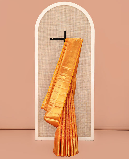 Rust Kanchipuram Wedding Silk Saree, Subtly Sparkled With Jacquard Design On Its Body, Highlighted by Zari Border of Thilakam Mokku, Diamond, and Muthu Designs, Grand Pallu and Paired with a Matching Blouse