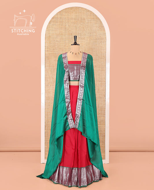 Tomato Red-Green Mercerised Cotton Half-Saree Features Plain with Contrast Traditional Zari Bordered Skirt, Paired with a Matching Blouse, and Comes with a Contrast Bordered Dhavani
