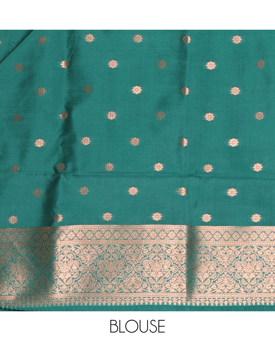 Green jacquard kanchi tissue saree, zari chakram motifs border, intricately zari woven pallu, and a matching zari design blouse