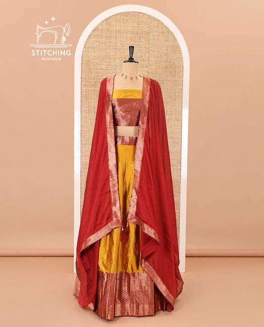 Mustard-maroon taffeta half-saree, zari buttas with contrast traditional zari bordered skirt, a matching blouse, and contrast zari border dhavani with belt