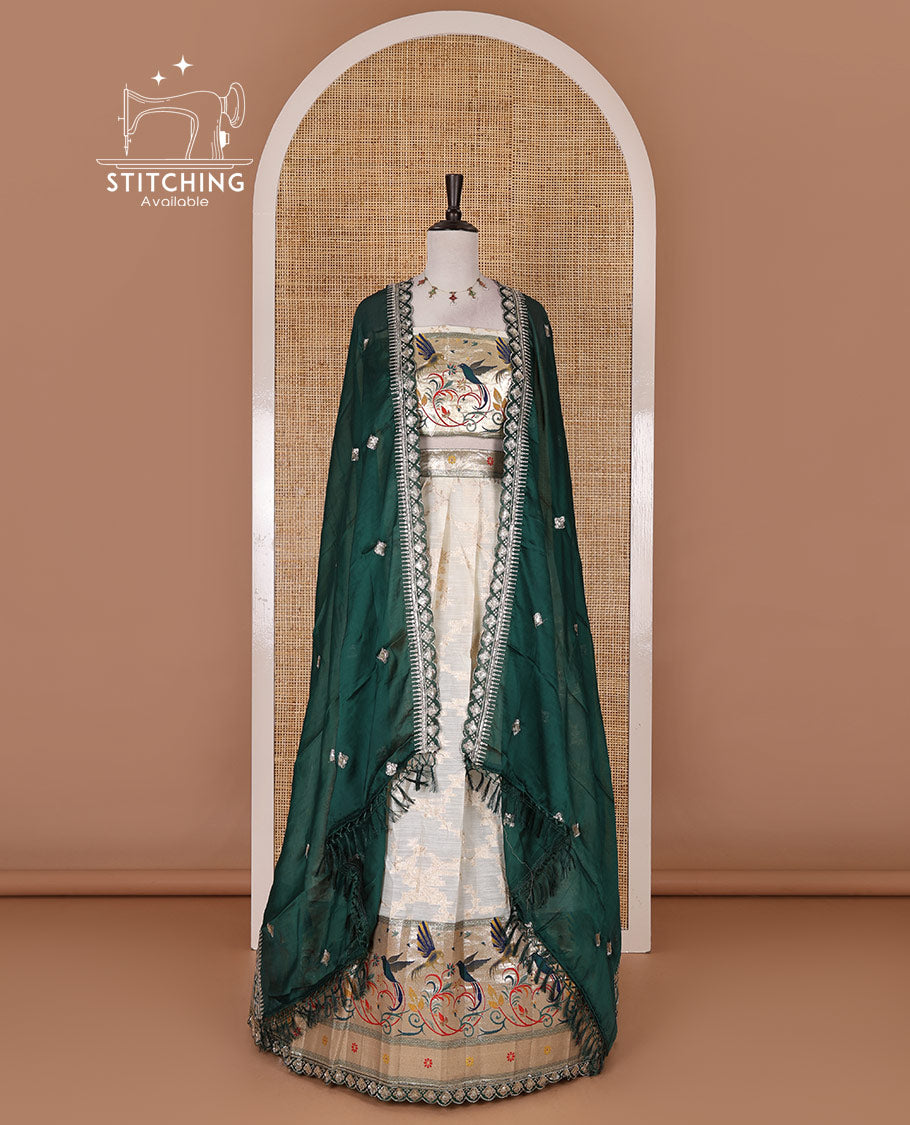 Cream banaras halfsaree, jaal jacquard skirt, contrast peacock green paithani border, matching blouse, and Syska georgette embroidered dhavani