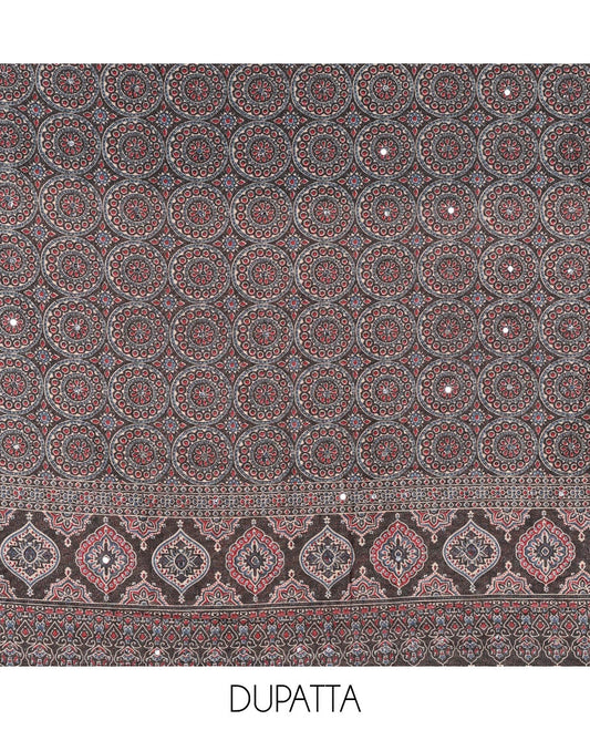 Black material chudidar set, plain Vichitra silk top, santoon bottom, and dupatta of Ajrakh print and mirror work