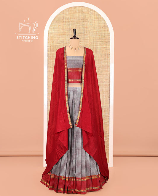 Grey and Red Sungudi Cotton Half-Saree, Elevated with Checked Design with Contrast Traditional Design Rettai Pettu Bordered Skirt, Comes with a Matching Blouse, and Is Paired with a Contrast Dhavani