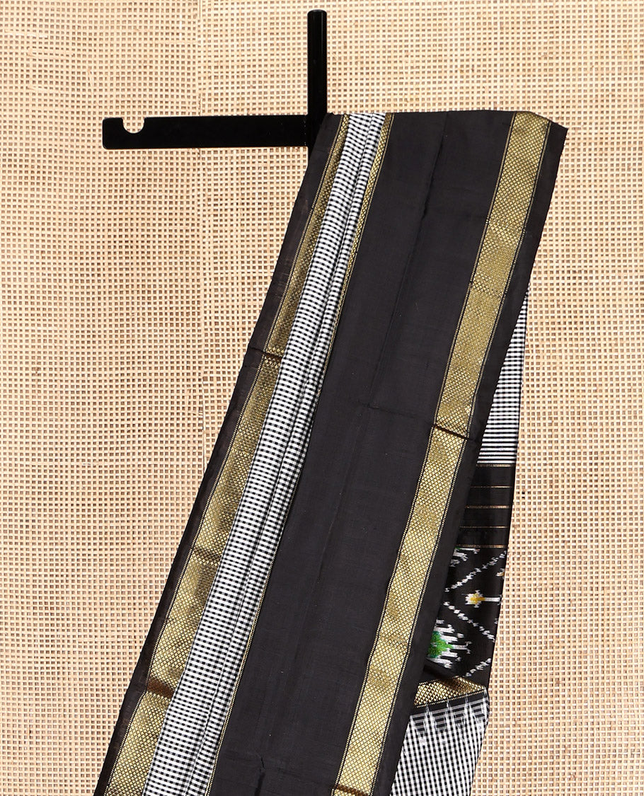 Black-White Micro-Checked Pochampally Ikat Silk Saree, Complemented by a Contrast Zari Cuckoo Bird-Eye Border, Ikat Jaal Pallu, and a Contrast Blouse