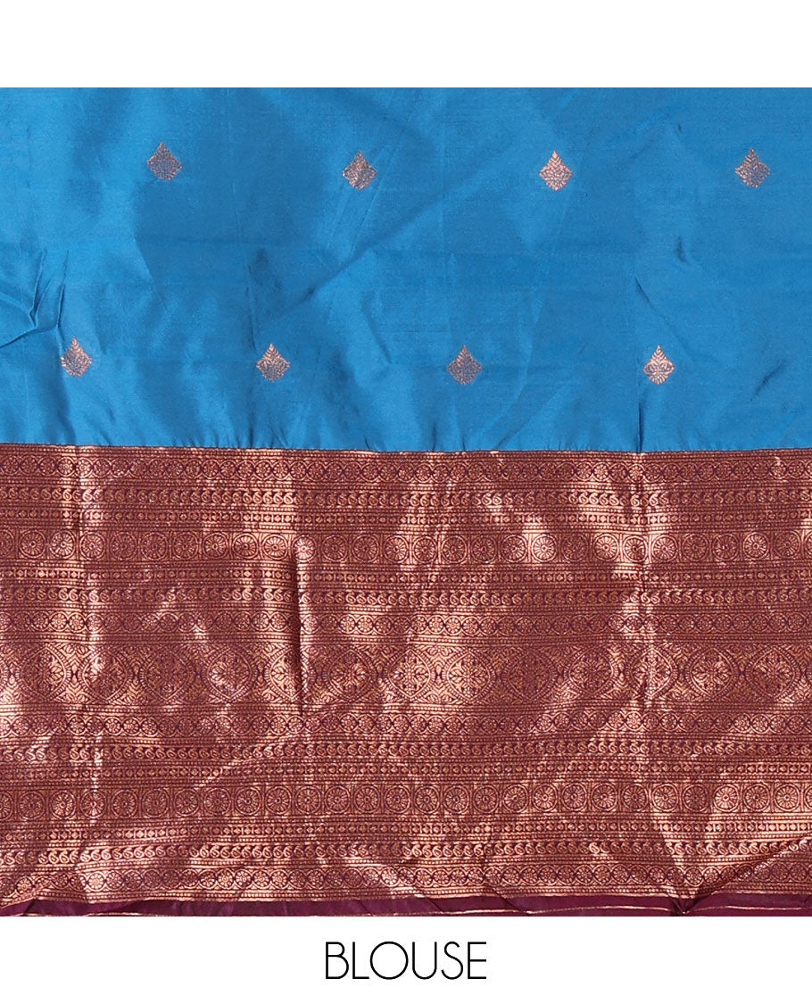 Blue taffeta silk half-saree, zari buttas and contrast traditional zari bordered skirt, a matching blouse, and contrast embroidered satin georgette  dhavani