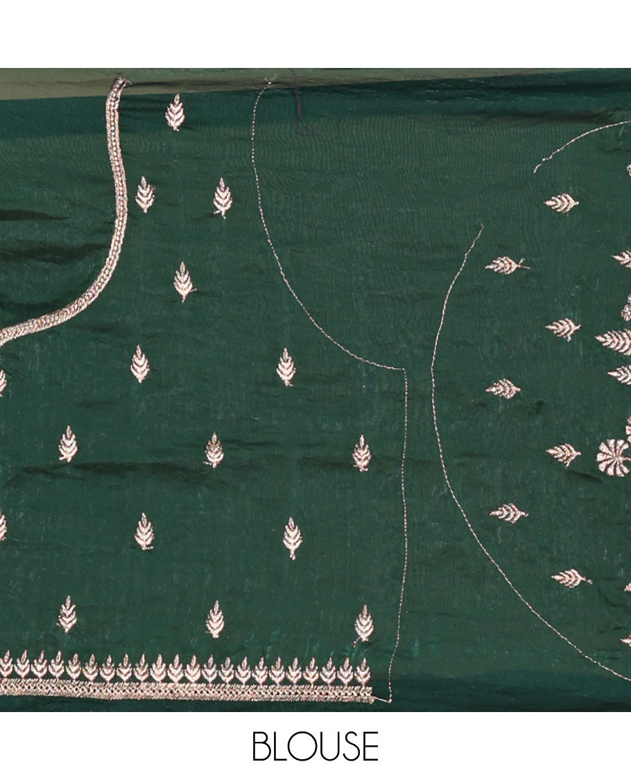 Green half-saree, floral and bird motifs embroidered velvet organza top, matching embroidered blouse, and contrast scallop embroidered syska georgette dhavani