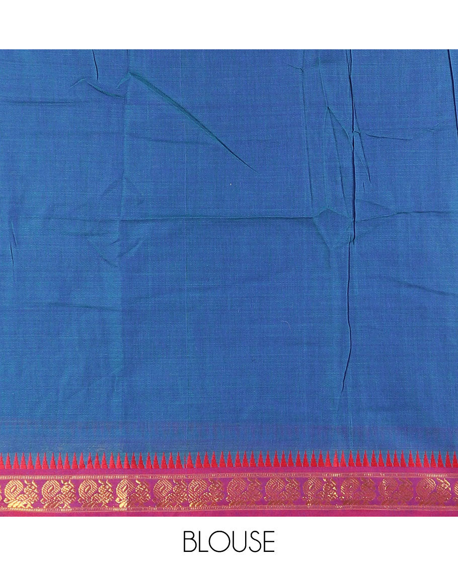 Blue half saree, plain with contrast zari peacock motifs bordered skirt, matching blouse and a contrast peacock border dhavani