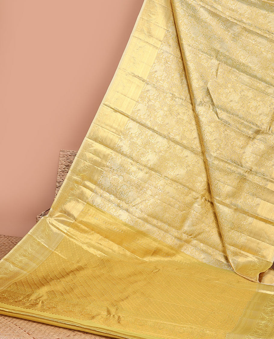 Green  floral vine design kancheepuram tissue silk saree, self border of muthu, banaras, manga design & intricate zari pallu