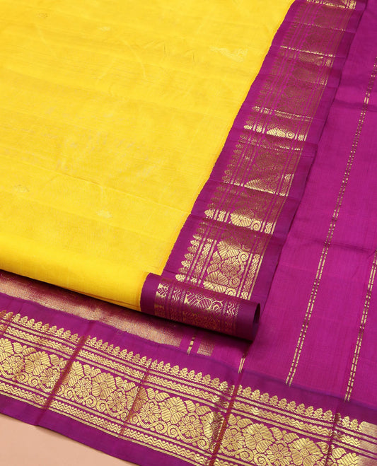 Yellow Kanchipuram Silk Saree, Mesmerized with Zari Buttas, Complemented by Contrast One-Sided Korvai Border of Banaras and Rettai Neli Designs, Pallu of Paisley and Floral Designs, and Comes Without a Blouse
