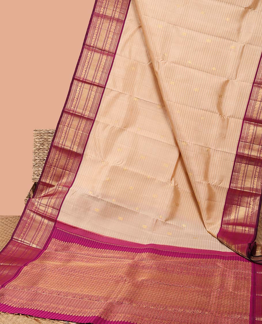 Cream striped kancheepuram silk saree with intricate zari pallu & korvai border of rekku,muthu,manga, vanki designs