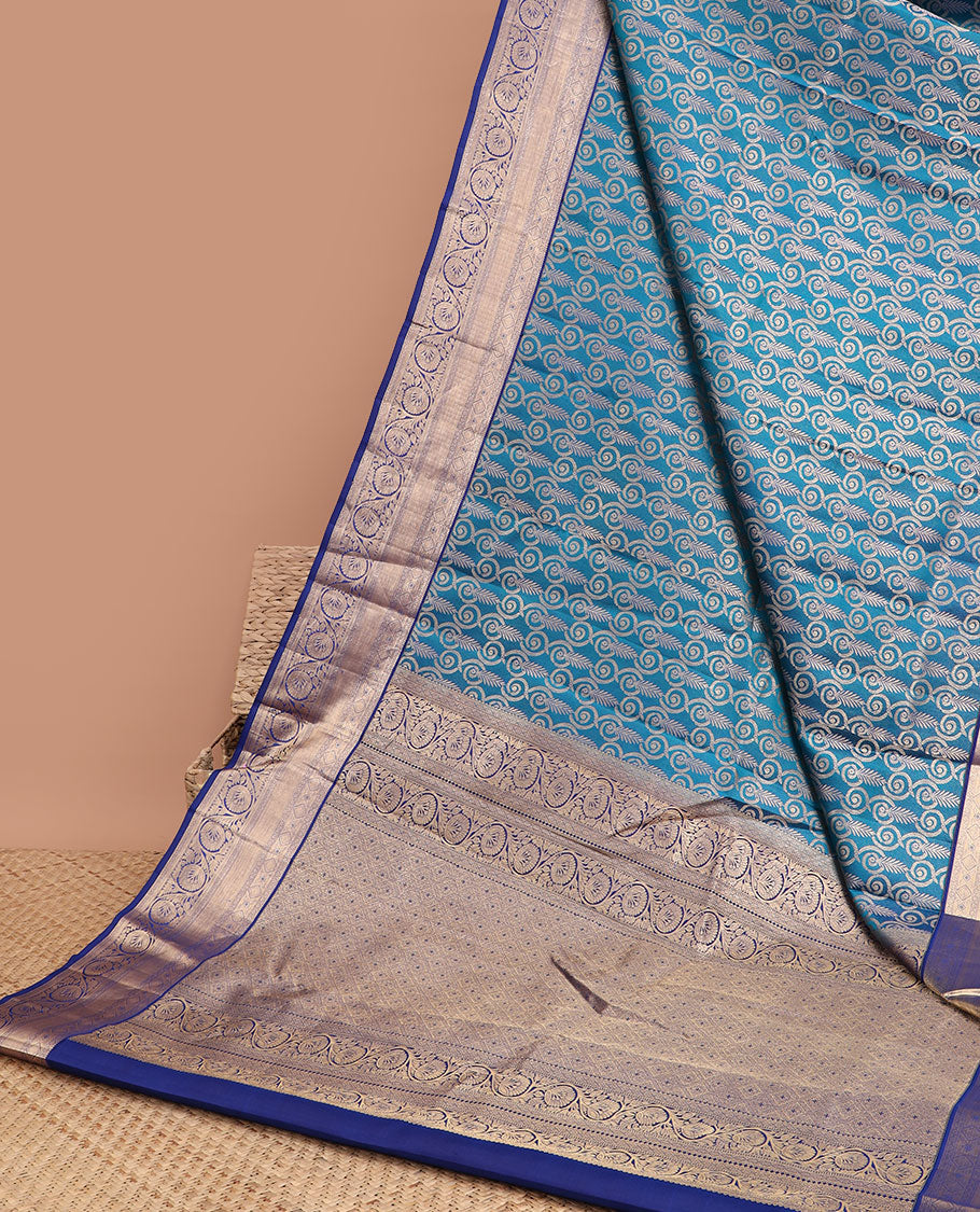 Blue leaf jacquard kancheepuram silk saree with contrast zari border & intricate zari design pallu