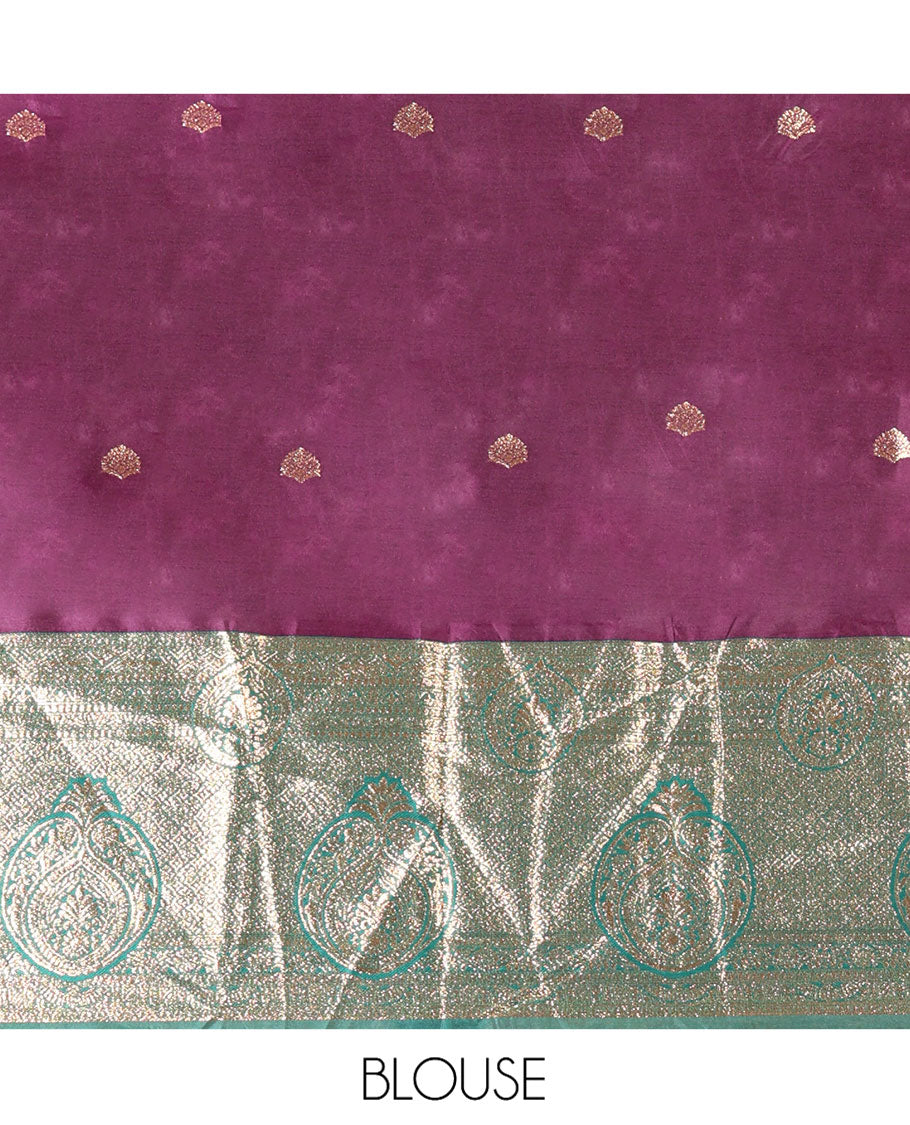 Purple and Green Semi-Banarasi Half-Saree, Entralled with Zari Buttas on Its Skirt, Complemented by a Contrast Intricately Zari-Designed Border, Paired with a Matching Blouse, and a Contrast Satin Georgette Embroidered Scallop Dhavani