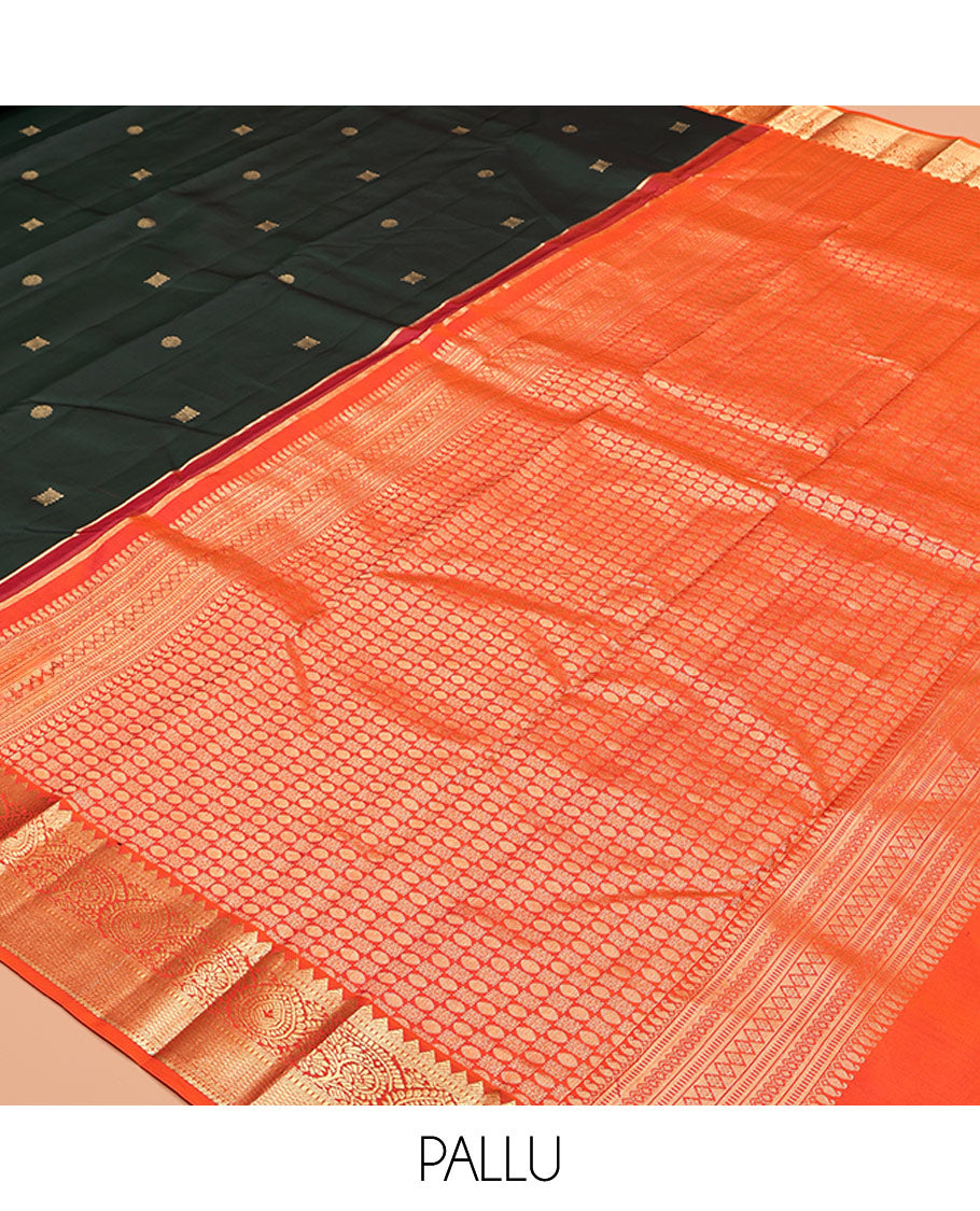 Green Vasundhara Silk Saree, Accentuated with Zari Buttas, Contrast Traditional Zari Border, Grand Pallu, and a Contrast Blouse