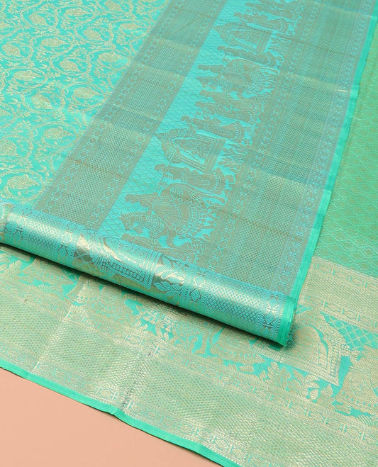 Turquoise Samudrika Silk Saree, Opulently Embellished with Floral Jaal Jacquard Design on Its Body, Highlighted by Zari Border of Diamond, Kuyil Kann, and Wedding-Theme Designs, Grand Jaal Pallu, and Paired with a Matching Blouse