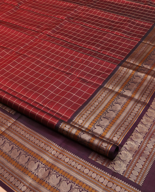 Red Kanchipuram Silk Saree, Bedecked with Checked Design on Its Body, Complemented by a Contrast Border of Rekku, Neli, Rudraksham, and Bird Designs, Pallu Depicts Flying Horse Motifs, and Paired with a Contrast Blouse