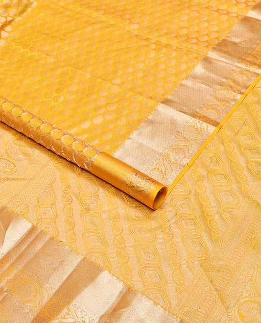 Yellow buttas kancheepuram silk saree with self border of intricate zari design border & floral design pallu