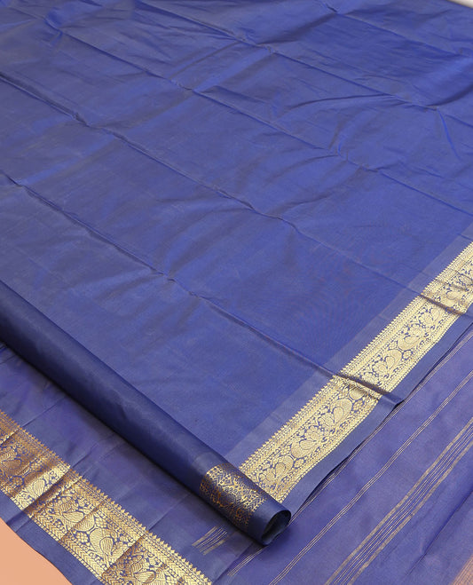 Blue Kanchipuram Silk Saree, Enriched with Zari Buttas, a Semi-Contrast Zari Border, Zari Design Pallu, and a Matching Blouse