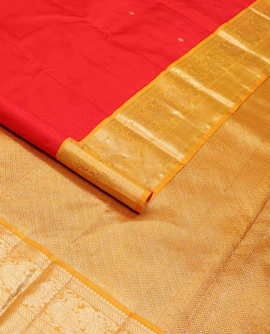 Red zari buttas Kanchipuram korvai silk saree, contrast neer korvai border of thilakam mokku, muthu, puli nagam, mayil and kuyil kann designs, and pallu of puli nagam designs