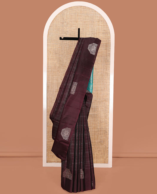 Maroon muthu kattam Kanchipuram silk saree, yaanai motifs zari border, and contrast pallu of yaanai, and chakram buttas