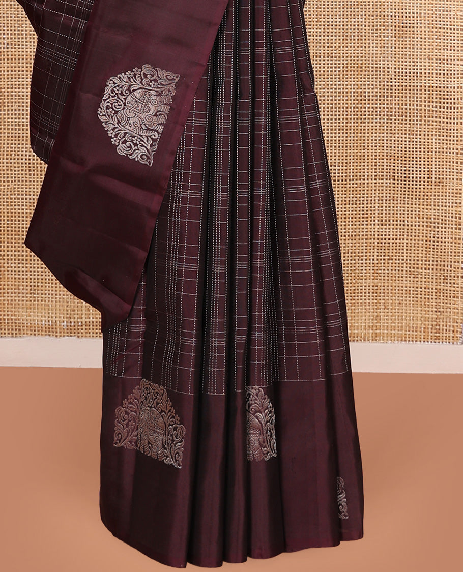 Maroon muthu kattam Kanchipuram silk saree, yaanai motifs zari border, and contrast pallu of yaanai, and chakram buttas