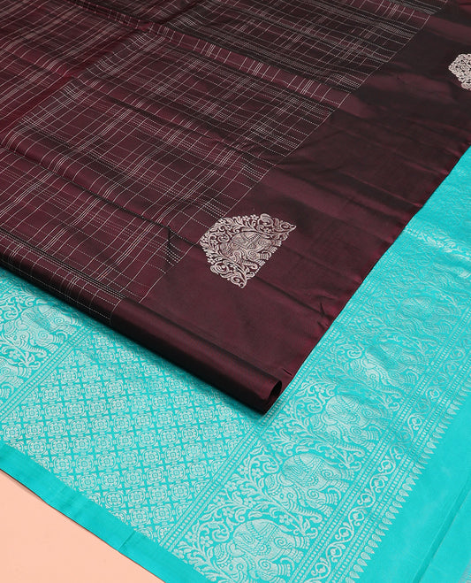 Maroon muthu kattam Kanchipuram silk saree, yaanai motifs zari border, and contrast pallu of yaanai, and chakram buttas