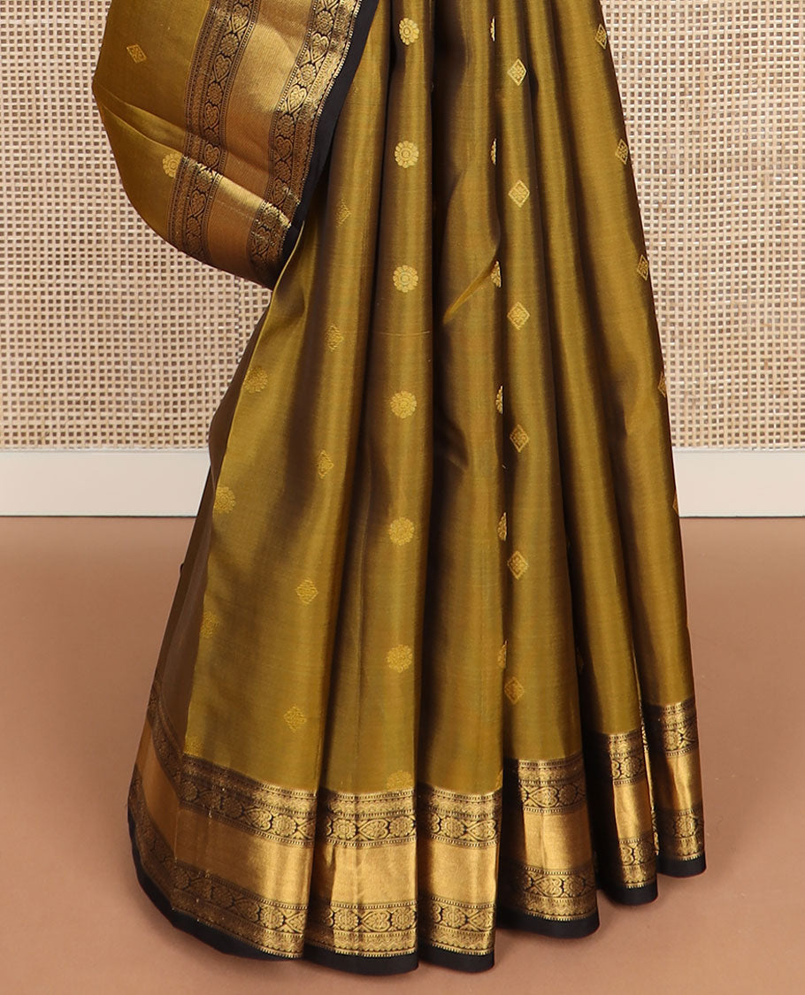 Green buttas vasundhara silk mix saree, contrast chakra motifs pallu & border of muthu,rettai neli poun,banaras,kattari,jadai nagam